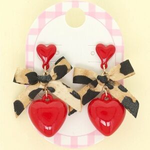 919. Red heart leopard bow earrings
